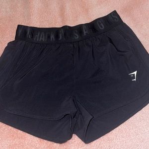 Sport shorts, the brand is gymshark, is size medium, black color